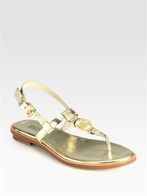 michael kors gold and black sneakers|Michael Kors gold sandals sale.